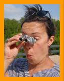 Woman Amazed looking through binoculars