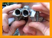 Research picture gallery of miniature binoculars.