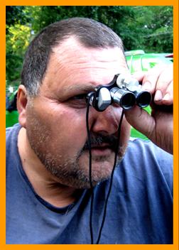 Man look for opportunity with binoculars