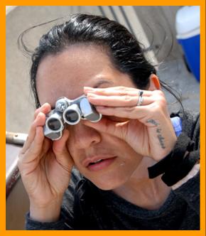 Woman Sightseeing with binoculars