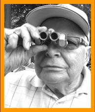 Man Birdwatching with Binoculars