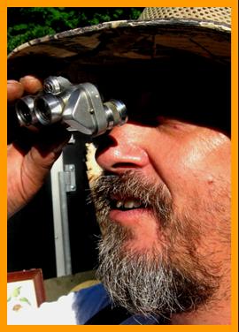 Farmer Observing with Tiny Binoculars