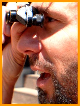 Bearded ManUsing Small Binoculars