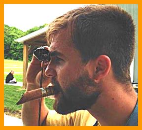 man Big Cigar Small Binoculars