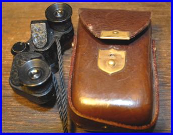 A Franks Manchester 6x15 miniature binoculars