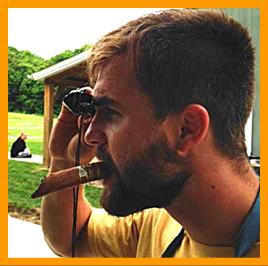 Man with Cigar looking through binoculars