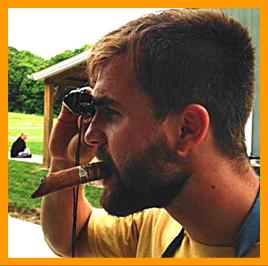 Man with Cigar looking through binoculars