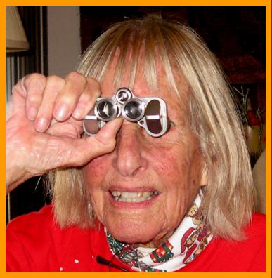 Woman looking through binoculars