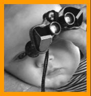 Baby with Miniature binoculars