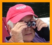 Woman looking through binoculars