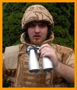 British soldier with binoculars. www.miniaturebinoculars.com