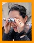 Woman Using Miniature Binoculars