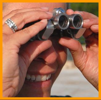 Smiling Woman with Miniature Binoculars