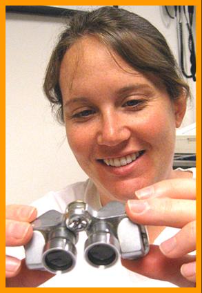 Woman Examining Binoculars