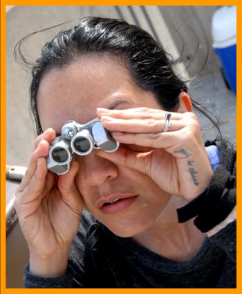 Woman using binoculars