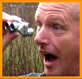 Man with Amazing Miniature Binoculars