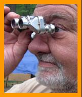 Bearded Man using binoculars