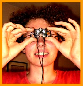Young Man with Miniature Binocularsi