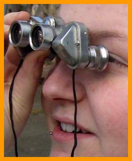 Young Girl Viewing With Binoculars