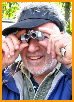 Amused Man with Tiny Binoculars