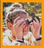 Woman Viewing with Miniature Binoculars