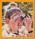 Woman Viewing with Miniature Binoculars