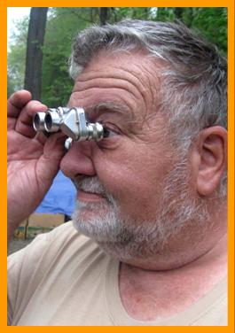 Elderly Man with Miniature Binoculars