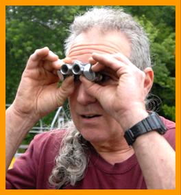 Man using Pocket Binoculars