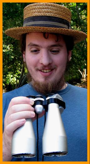 Happy Young Farmer with Binoculars