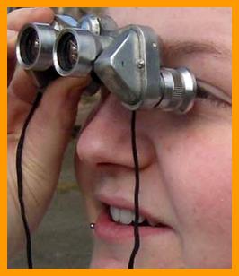 Young Girl Viewing With Binoculars