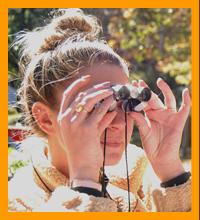 Woman Viewing with Miniature Binoculars