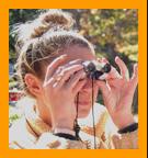 Woman Viewing with Miniature Binoculars