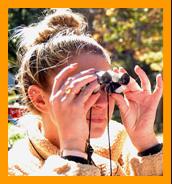 Woman Viewing with Miniature Binoculars.
Woman looking through binoculars. 
Woman using binoculars.
Femme utilisant de jumelles.
Frau mit fernglas.
Mujer usando binoculares.
Kvinna som anvander kikare.
Donna che usa il binocolo.
Vrouw met verrekijker.
Kvinne som bruker kikkert.
Kobiete za pomoca lornetki.
Muz pouzvajici dalekohled.
Kvinde de burger en kikkert.
No hasznal.tavcsovet.
Nainen kayttaa kiikareita.
Mulher usando binoculos.
Sieviete kas izmando binokli.
Moteris besinaudojanti ziuronais. 
