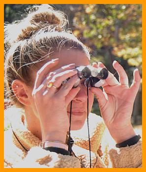 Woman Viewing with Miniature Binoculars