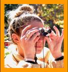 Woman Viewing with Miniature Binoculars.
Woman looking through binoculars. 
Woman using binoculars.
Femme utilisant de jumelles.
Frau mit fernglas.
Mujer usando binoculares.
Kvinna som anvander kikare.
Donna che usa il binocolo.
Vrouw met verrekijker.
Kvinne som bruker kikkert.
Kobiete za pomoca lornetki.
Muz pouzvajici dalekohled.
Kvinde de burger en kikkert.
No hasznal.tavcsovet.
Nainen kayttaa kiikareita.
Mulher usando binoculos.
Sieviete kas izmando binokli.
Moteris besinaudojanti ziuronais. 
