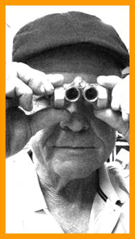 Man Looking Through Binoculars