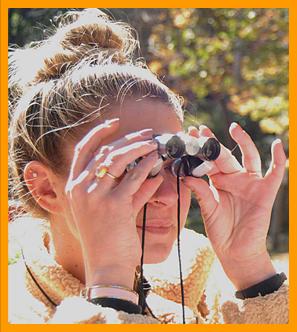 Woman Viewing with Miniature Binoculars