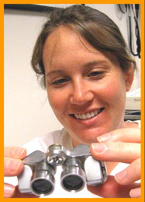 Woman Examining Binoculars