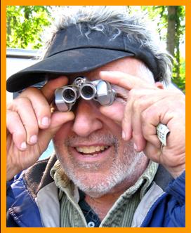 Amused Man with Tiny Binoculars