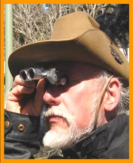 Mark Ohno in Australian Hat with Binoculars.
Man looking through binoculars.
Man using binoculars.
Mark Ohno avec jumelles.
Homme utilisant de jumelles.
Mark Ohno mit fernglas.
Man mit fernglas.
Mark Ohno con binoculares 
Hombre usando prismaticos.
Mark Ohno med kikare.
Man som anvander kikare.
Mark Ohno con binocolo.
Uomo che usa il binocolo.
Mark Ohno met verrekijker.
Man met verrekijker.
Mark Ohno som bruker kikkert.
Man som bruker kikkert.
Czlowiek za pomoca lornetki.
Muz pouzvajici dalekohled 
Mand burger eb kikkert.
Ember tavcsovet hasznal.
Mies kayttaa kikareita.
Mark Ohno usando binoculos.
Homem usando binoculos.
Cilveks kas izmanto binokli.
Vyras naudodamas ziuronus.