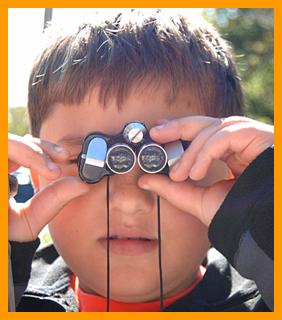 Child Using Miniature binoculars