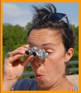 Shocked Woman Looking Through Binociulars