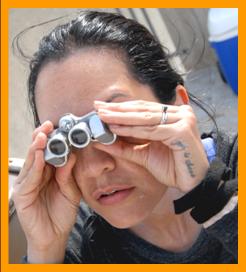 Tatooed Woman with Binoculars