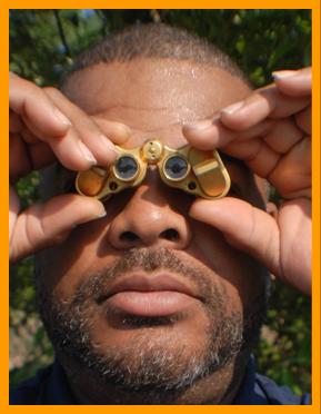 Looking at the future with miniature binoculars.
Man using binoculars.
Man with binoculars.
Homme utilisant de jumelles.
Homme avec jumelles.
Hombre usando binoculares.
Hombre usando prismaticos.
Hombre con prismaticos.
Man som anvander kikare.
Uomo che usa il binocolo.
Man met verrekijker.
Man son bruker kikkert.
Czlowiek za pomoca lornetka.
Muz pouzvajici dalekohled.
Mand burger en kikkert.
Ember tavcsovet hasznal.
Mies kayttaa kiikareita.
Homem usando binoculos.
Cilveks, kas izmanto binokli.
Vyras naudodamas ziuronusb 
双眼鏡を持つ男
拿著望遠鏡的男人
쌍안경을 든 남자
दूरबीन वाला आदमी
Человек с биноклем
Άνδρας με κιάλια
رجل يحمل منظار
איש עם משקפת
